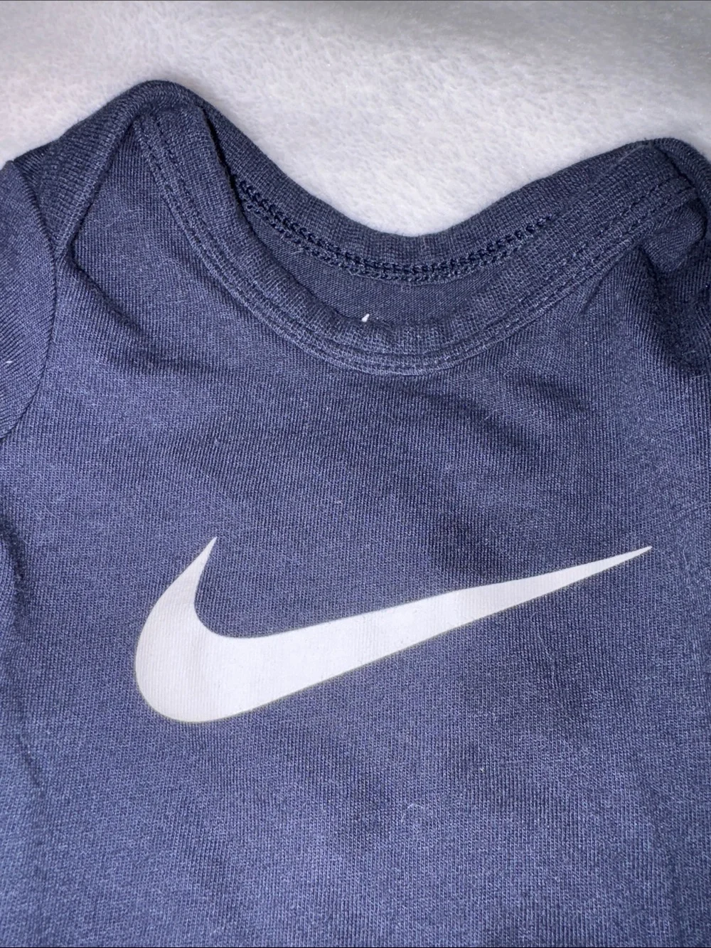 Nike newborn Navy One-Piece Bodysuit with White Swoosh